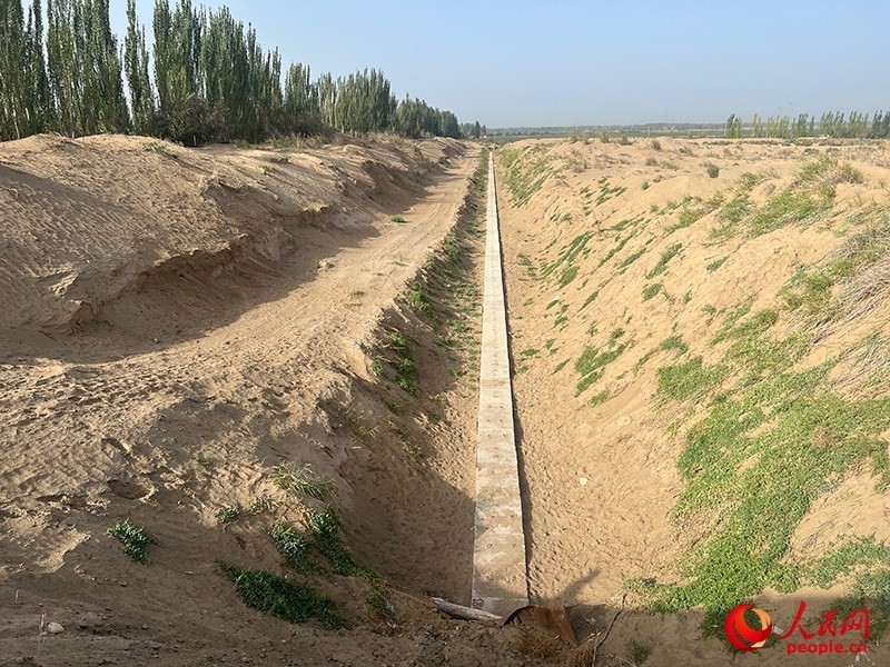 斗渠改造后，大大提高了輸水效率。人民網(wǎng)記者 常雪梅攝