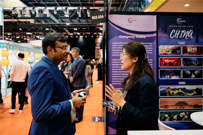 “中國(guó)館”展區(qū)現(xiàn)場(chǎng)洽談。 楊浩鵬攝