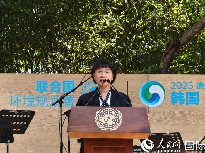 周國(guó)梅致辭。人民網(wǎng)記者 李明攝